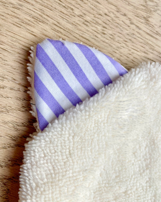 Le gant de toilette marionnette qui prend le soleil