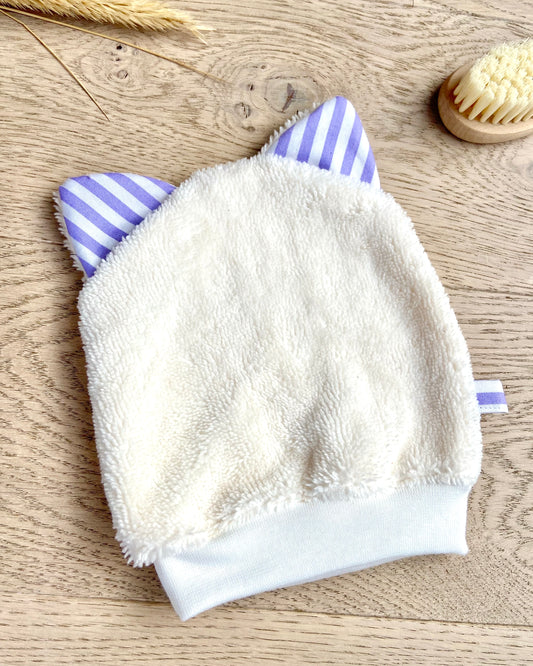 Le gant de toilette marionnette qui prend le soleil