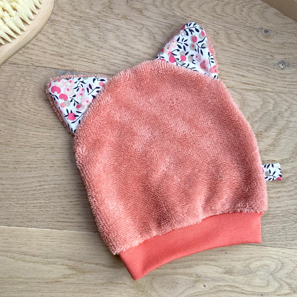 Le gant de toilette marionnette qui aime le rose