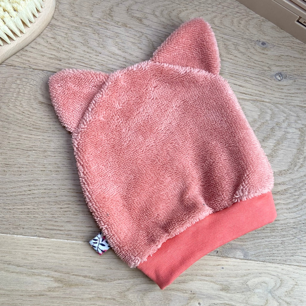 Le gant de toilette marionnette qui aime le rose