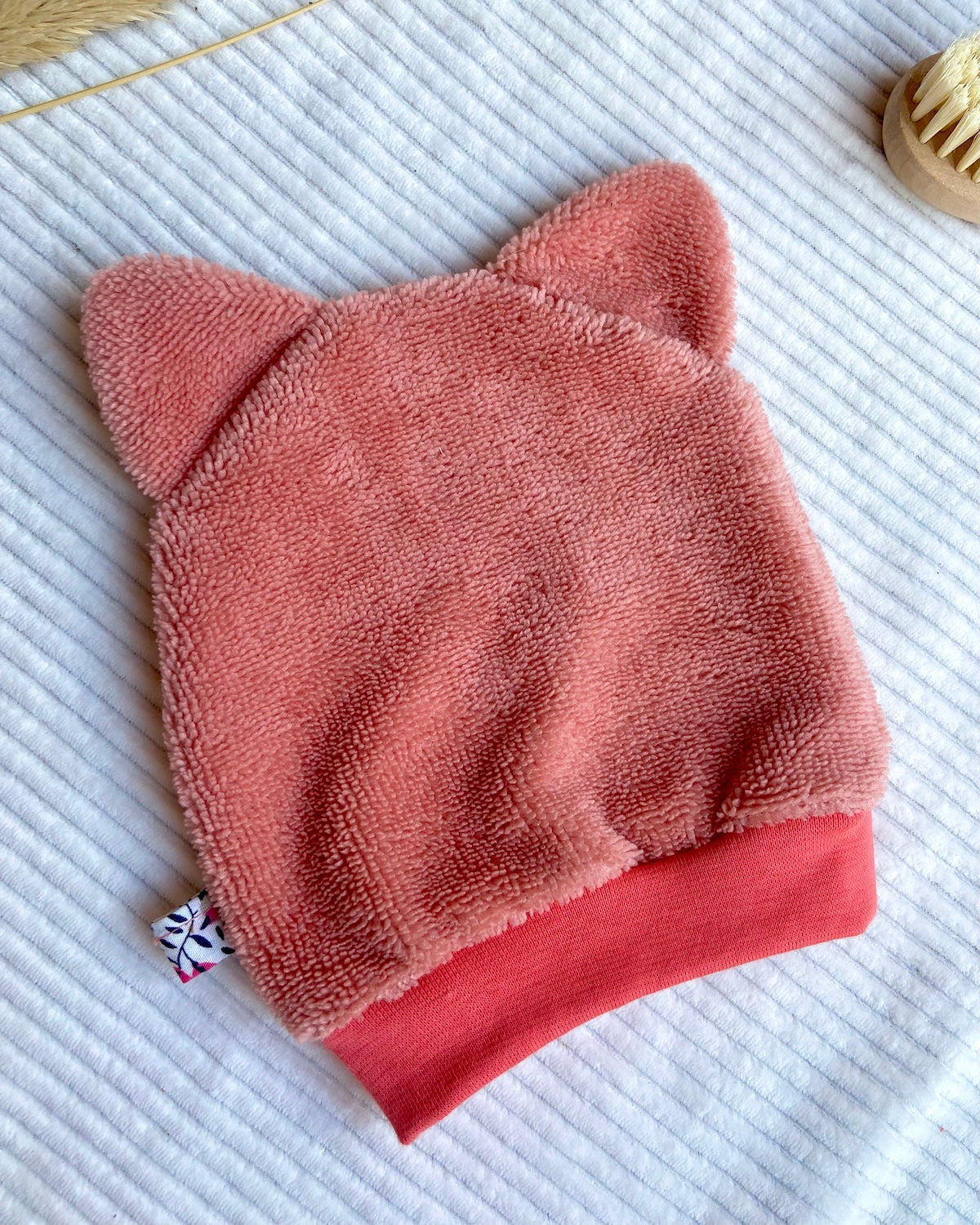 Le gant de toilette marionnette qui aime le rose