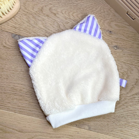 Le gant de toilette marionnette qui prend le soleil